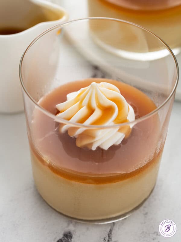 Glass of butterscotch pudding and caramel whipped cream
