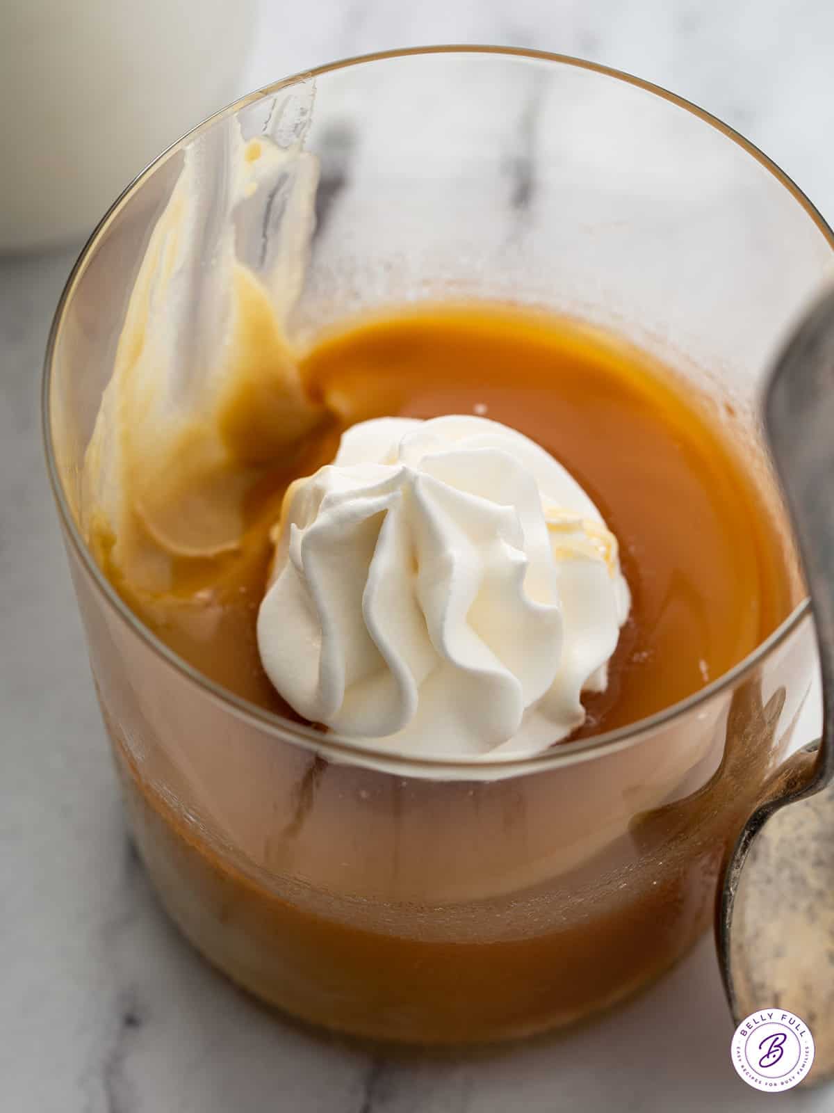 cup of pudding with whipped cream