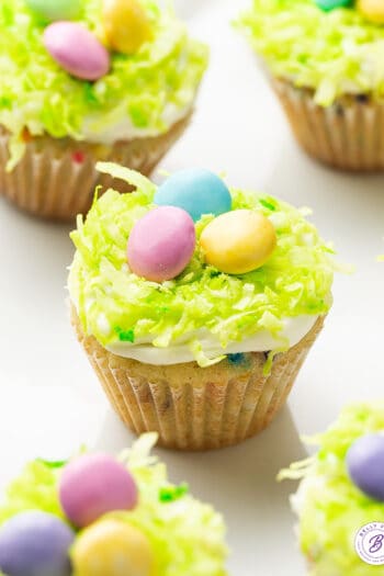 Mini Frosted Easter Cupcakes with pastel M&Ms