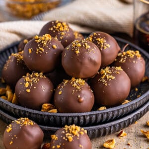 plate of Kahlúa Chocolate Truffles garnished with hazelnut crumbs