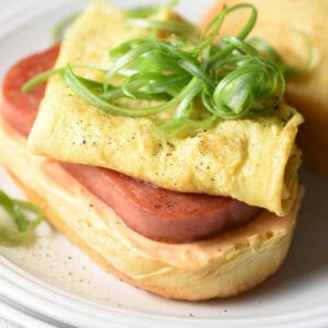 SPAM Breakfast Sandwich topped with egg and scallions