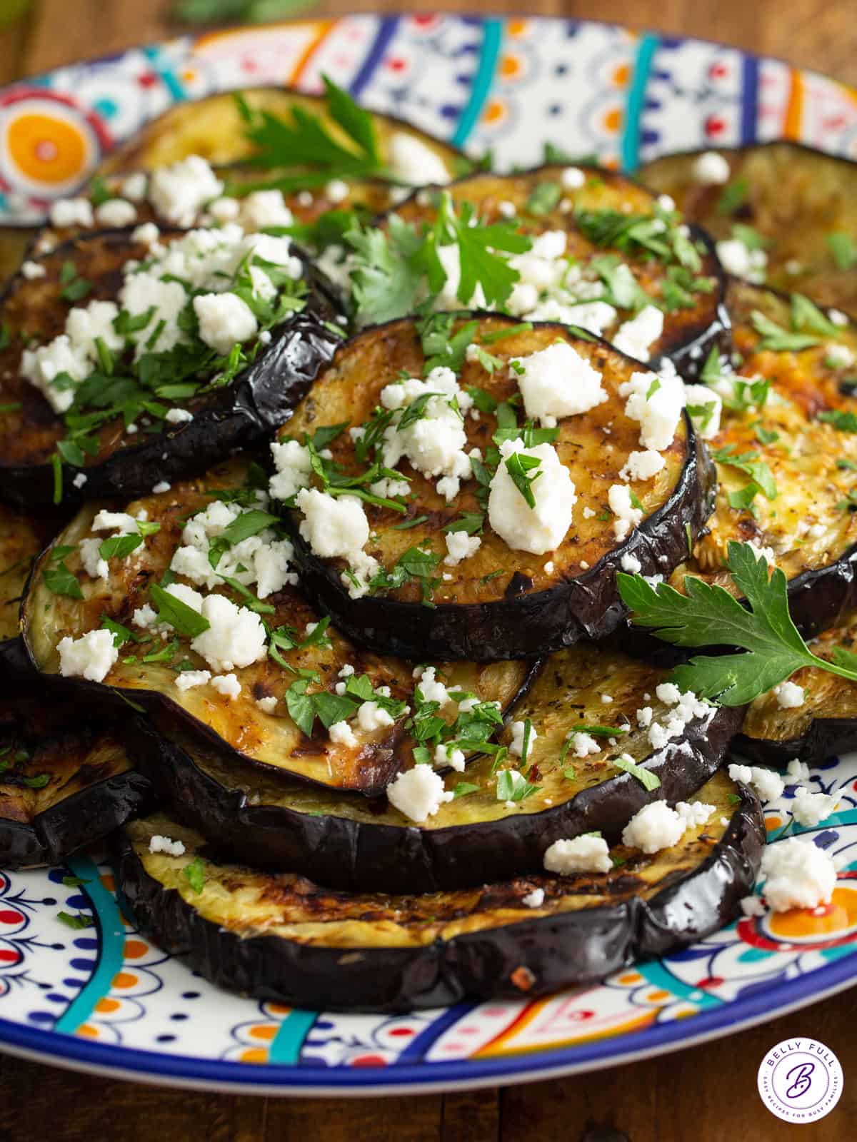 cooked sliced eggplant with crumbled feta