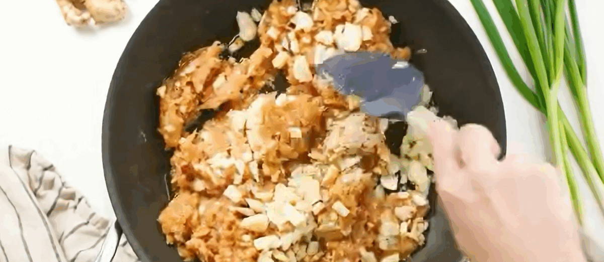 Cooking the chicken mixture.