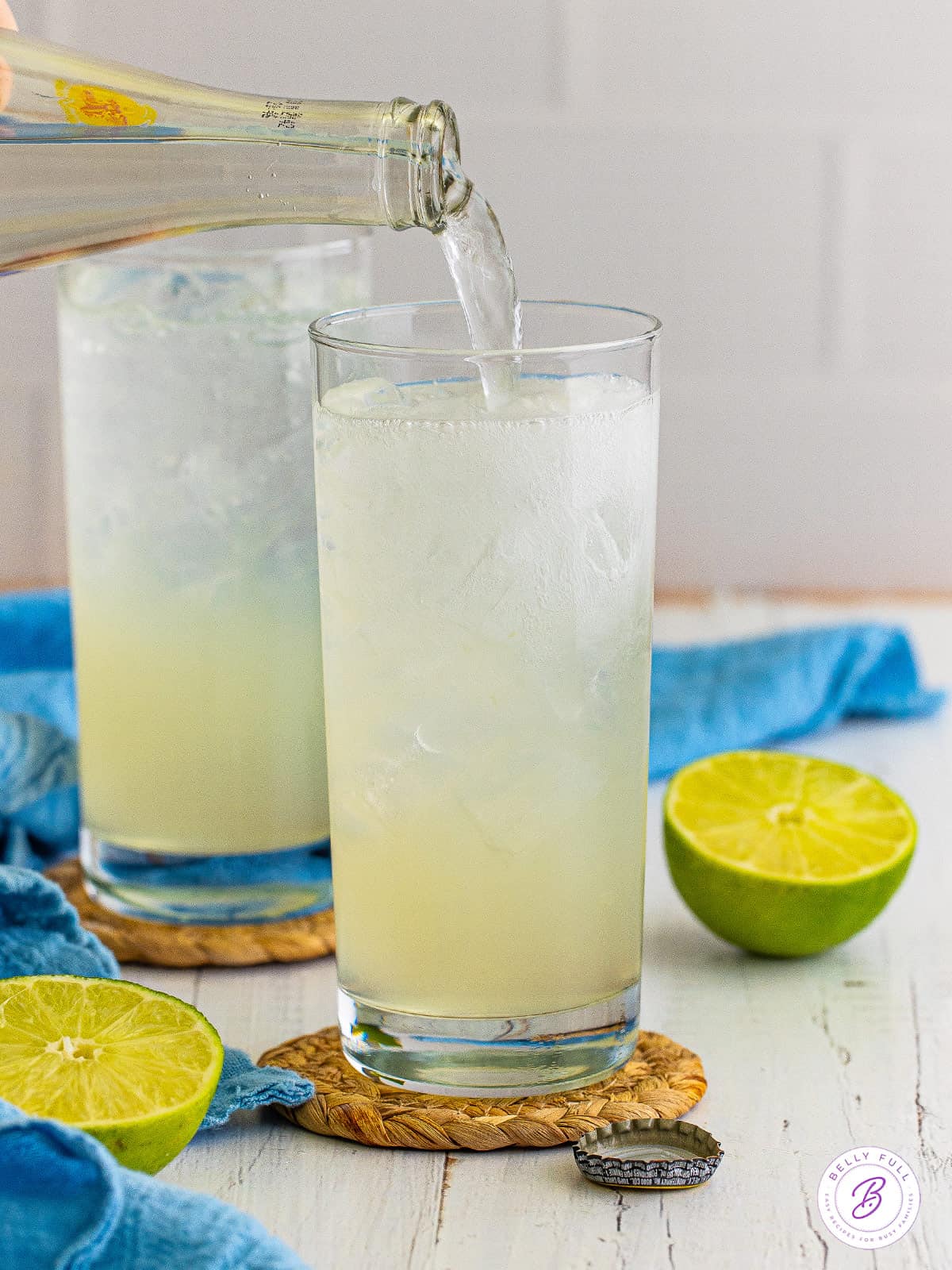 Topo chico being poured into a ranch water cocktail