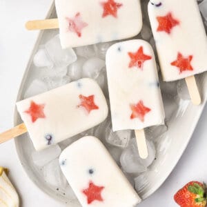 Overhead view of yogurt popsicles with red stars