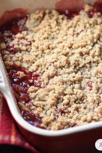 strawberry rhubarb with crumble topping in baking dish