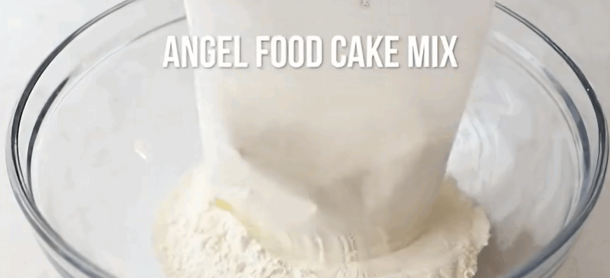 Combining all the ingredients in a mixing bowl.