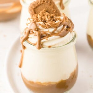 A cheesecake jar topped with Biscoff