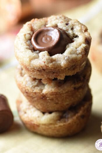 stack of 3 baked praline rolo cookie cups