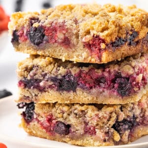 A stack of three berry crumb bars