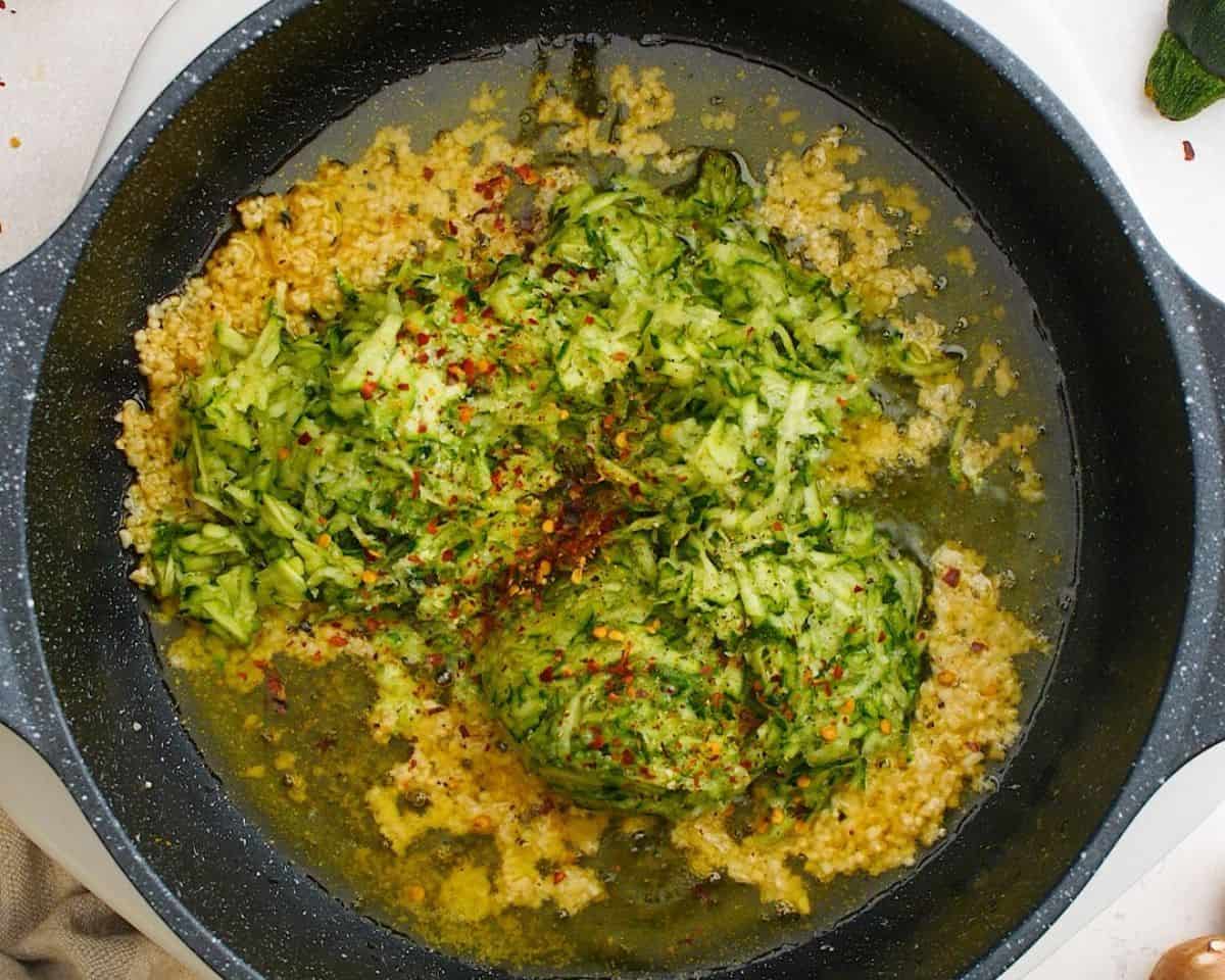 Cooking the veggies and garlic.