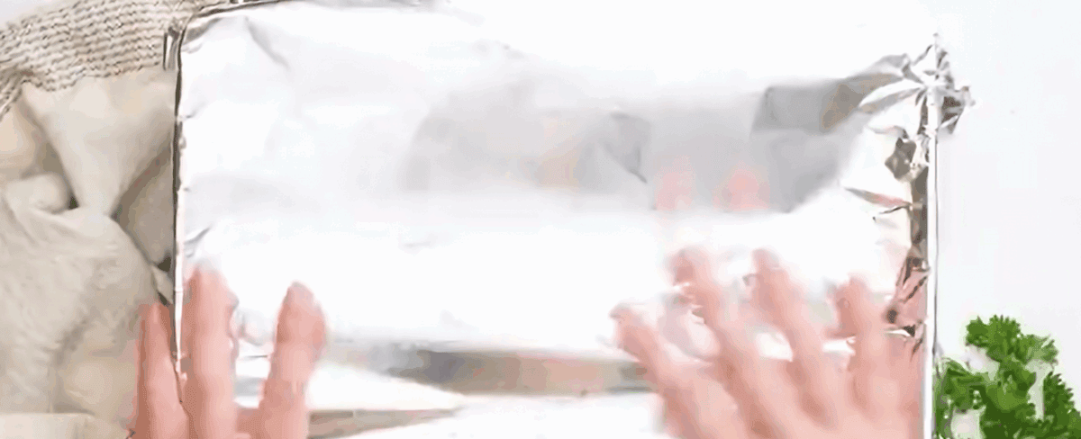 Casserole dish covered with aluminum foil.