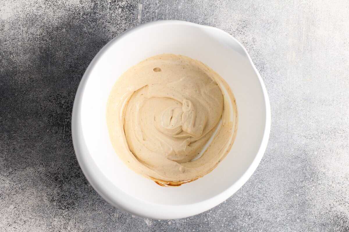 Ingredients to make the sauce in a white bowl.