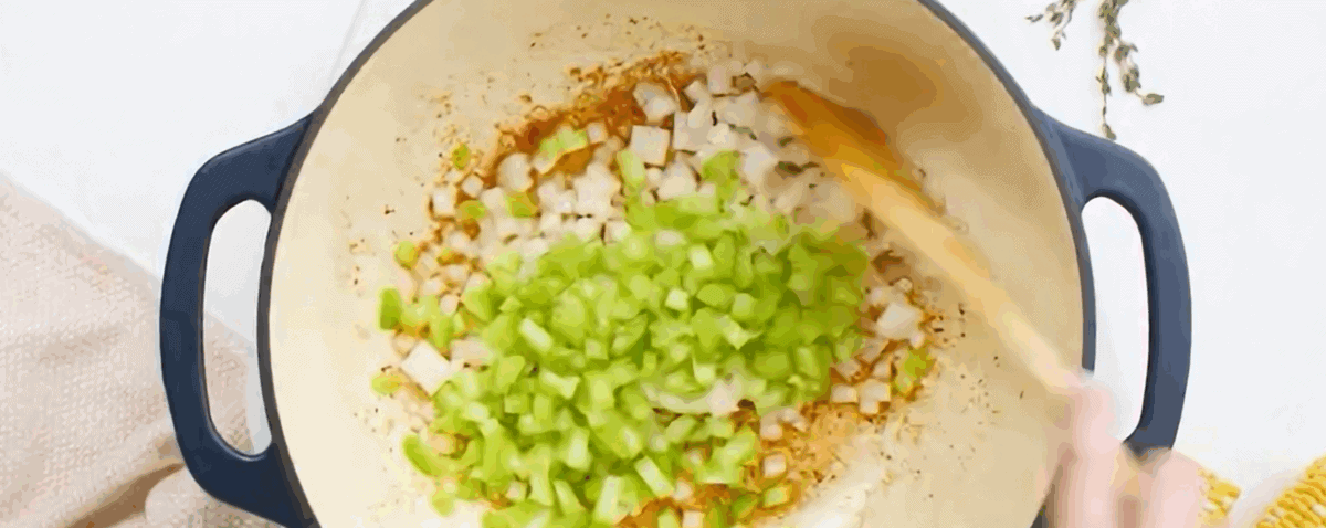 Cooking onion and celery in the pot with butter and bacon grease.