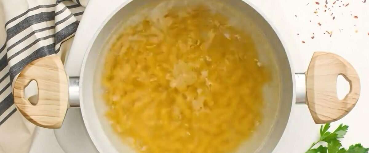 Cooking pasta in boiling water.