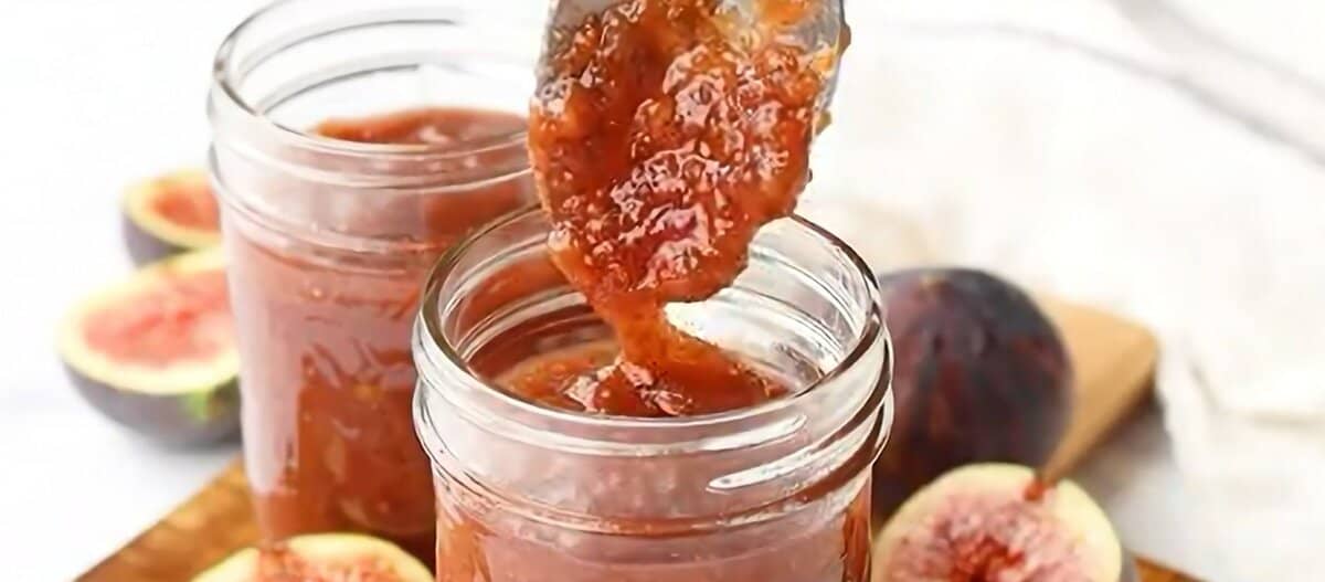 Transferring the jam to a jar. 