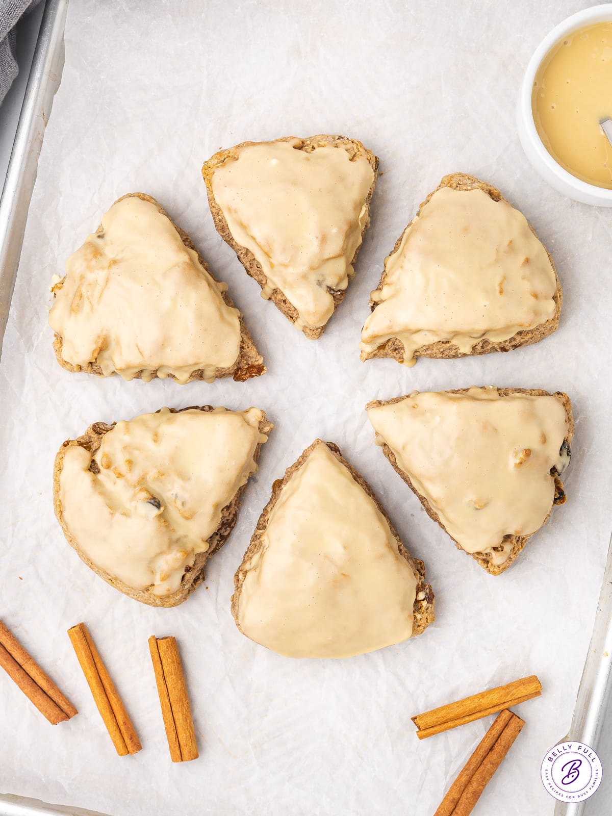 6 wedge glazed scones on parchment paper