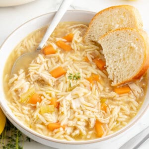 A bowl of lemon chicken orzo soup