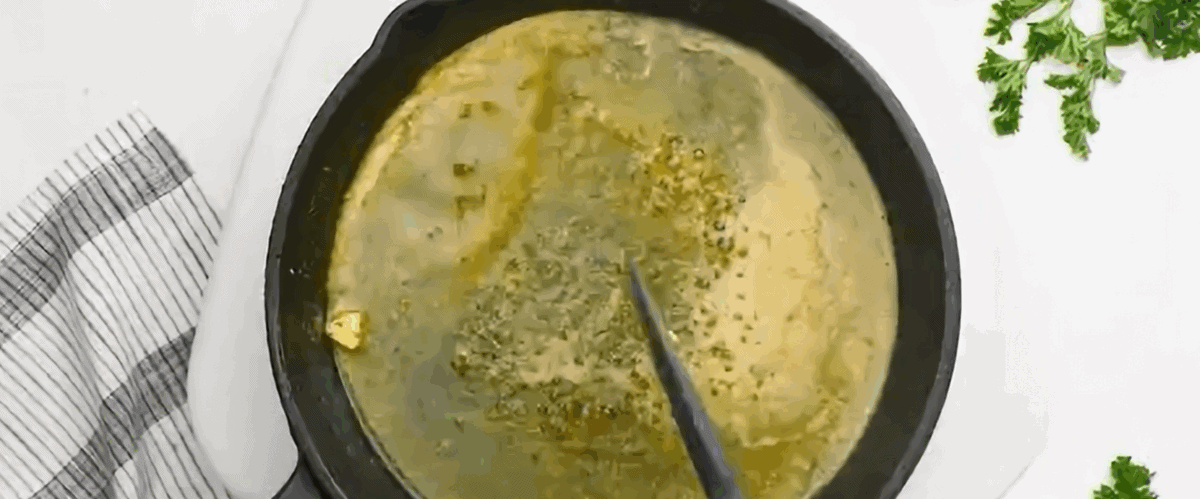 Making the sauce in a skillet. 