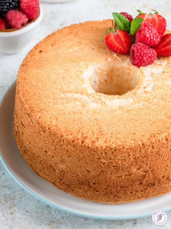 close up round angel food cake on plate