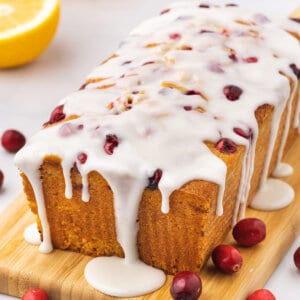 loaf of cranberry orange bread with icing