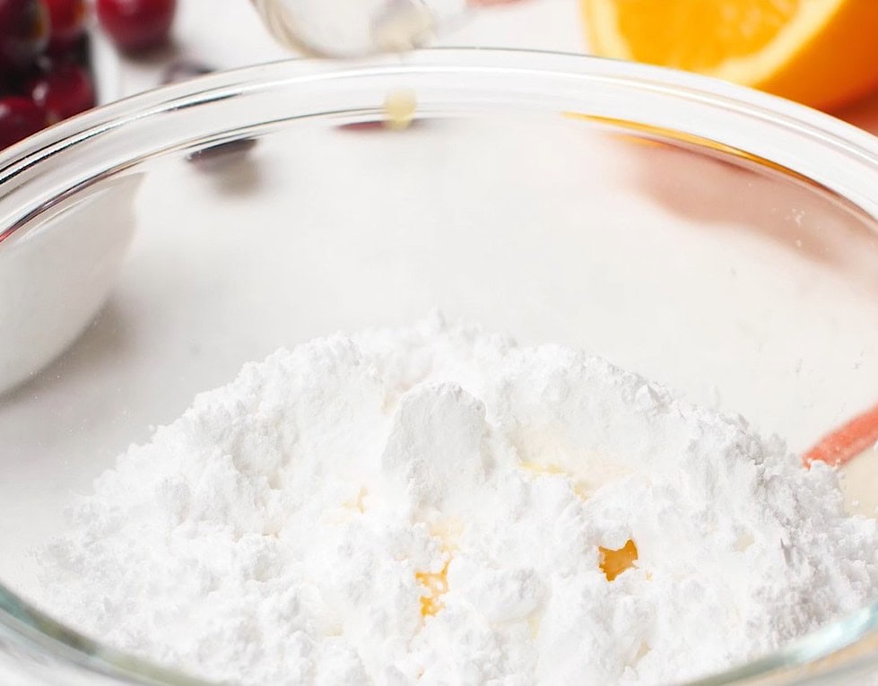 Making the glaze for the cranberry orange brad.