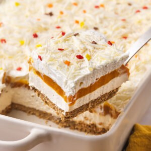 A spatula serving a slice of pumpkin lasagna