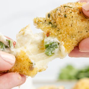 A hand pulling apart a rattlesnake bite