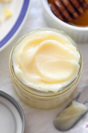 overhead whipped honey butter in glass jar