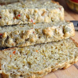 sliced olive bread on cutting board