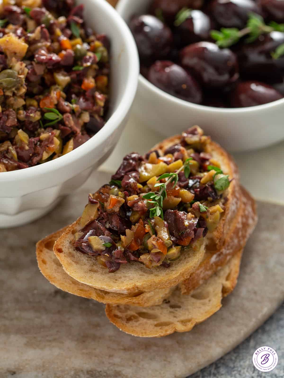 chopped olives on crostini