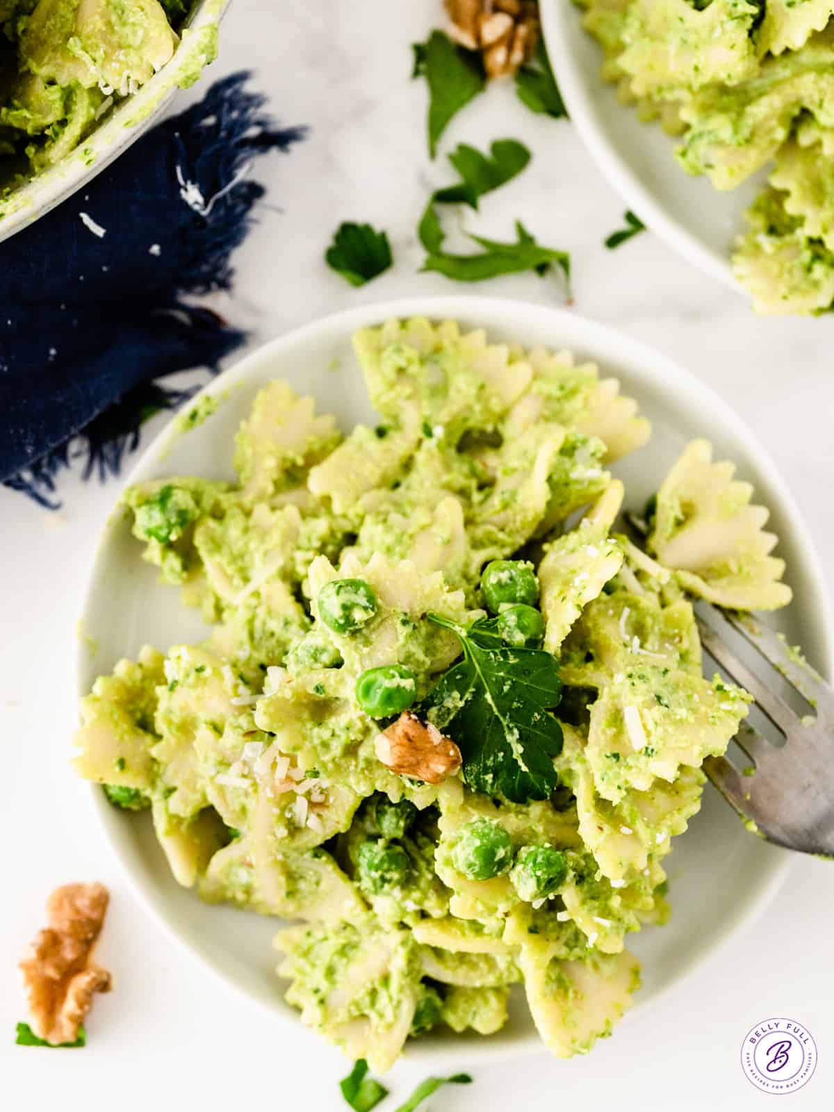 bowtie pasta coated in pea pesto sauce