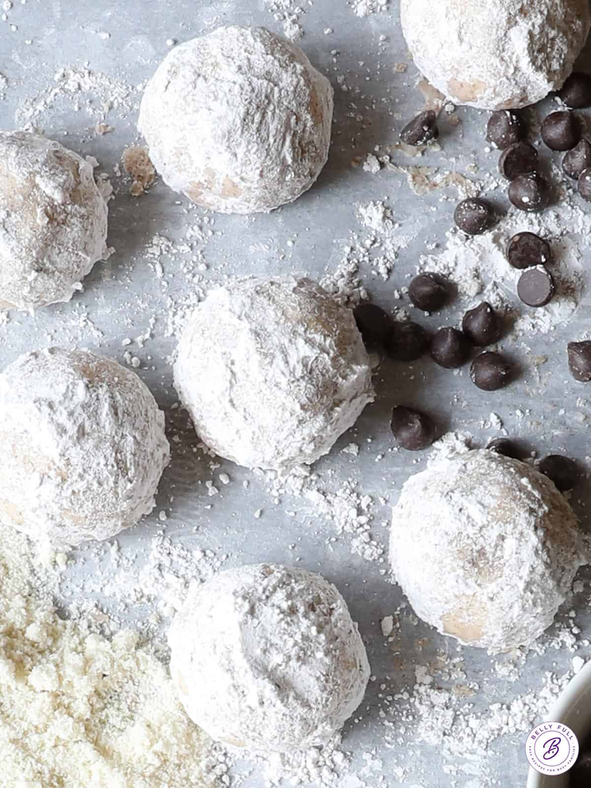 overhead snowball cookies on parchment paper