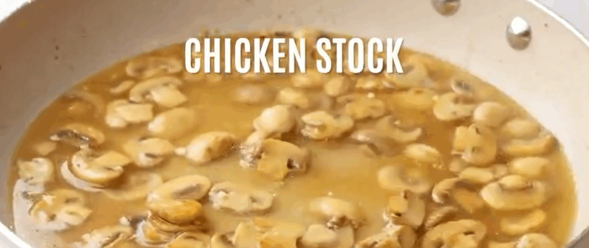 Deglazing the pan with white wine and chicken stock.