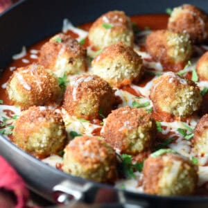 Chicken Parmesan Meatballs in pan with tomato sauce