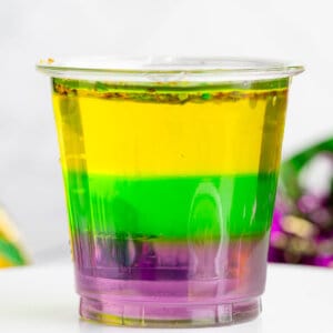 purple, green, and yellow layered Mardi Gras jello shots