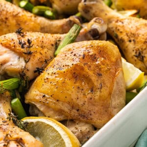 close up roasted skin-on chicken thigh