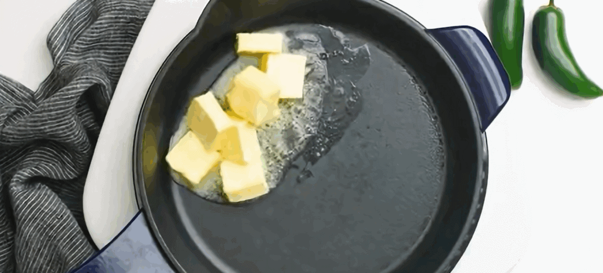 Melting butter in a cast iron skillet.
