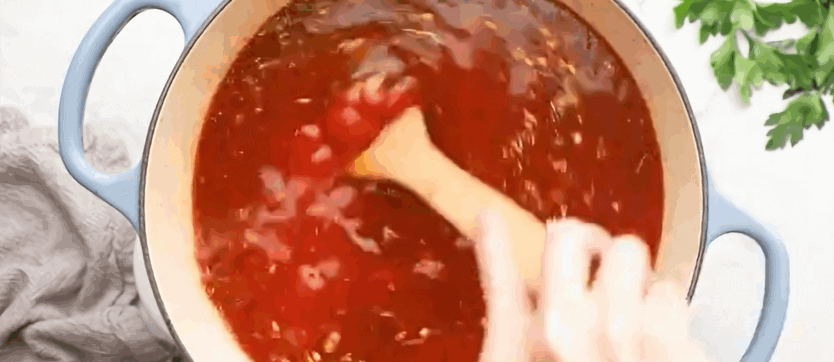 Adding all the remaining ingredients to the soup pot.