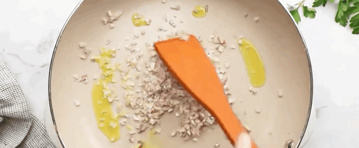 Cooking the aromatics and vegetables.