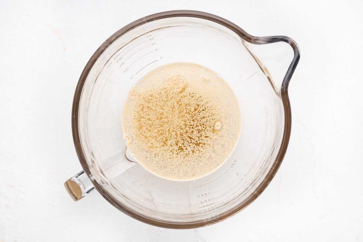 Combining the ingredients to get the yeast to bloom.