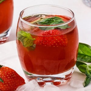 Strawberry basil cocktail in a short glass