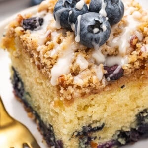 Close up of a slice of blueberry coffee cake