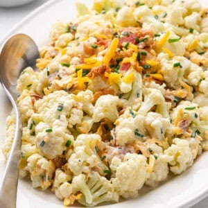 Cauliflower salad on a white serving platter