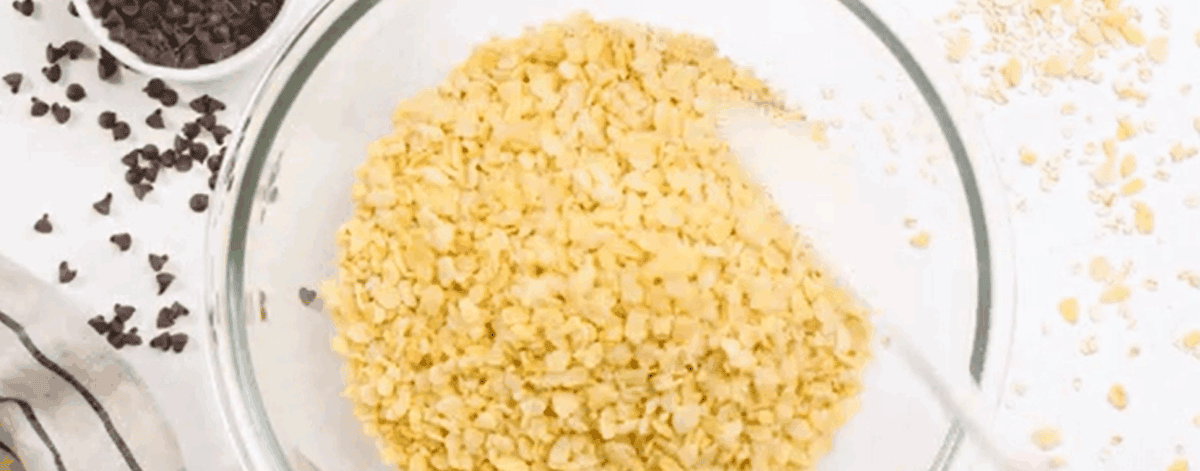 Oats and rice cereal in a glass bowl. 