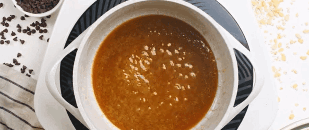 Sugar mixture simmering in a pot. 