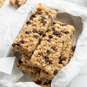 stacked homemade granola bars in container