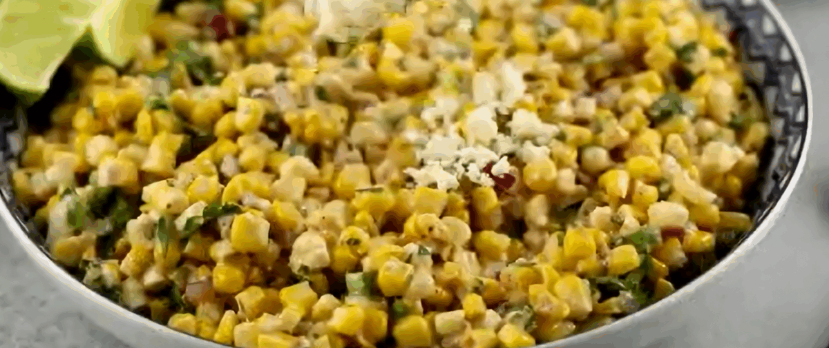 Combining the dressing with the other ingredients.