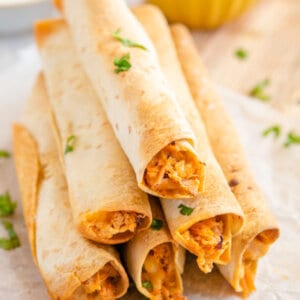 pyramid stack of baked Pulled Pork Taquitos