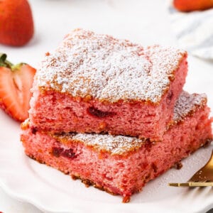 2 stacked slices of strawberry cake